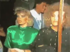 Madonna in green satin at a party