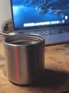 laser pointer on metal cup
