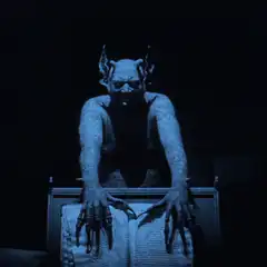 Demon reading a book