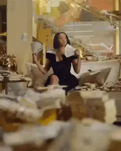 Woman fanning herself with money in a messy room