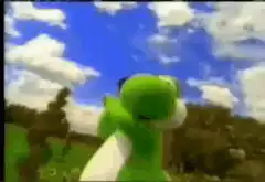 Yoshi holding a black object