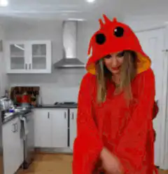 Woman in lobster costume dancing
