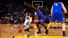basketball player falls while dribbling