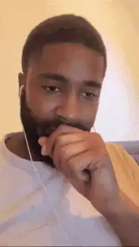 Man listening to music with a cutout behind him