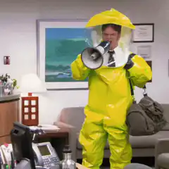 Dwight Schrute in hazmat suit with megaphone