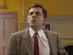 Mr. Bean confused and waving
