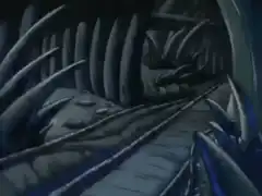 He-Man walks past a giant skull