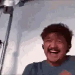 Man laughing then facepalming