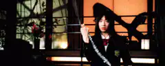 Japanese girl with sword and hair flip