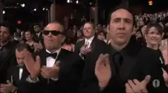 Nicolas Cage and Harvey Keitel clapping