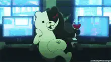 Monokai holding wine glass