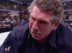 Vince McMahon crying in wrestling ring