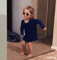 Toddler doing the dab dance