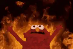 Elmo surrounded by fire