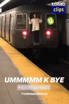Girl waving goodbye from subway train