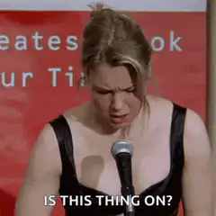 Woman tapping microphone is this thing on