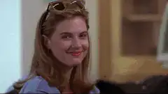 Woman smirking at a guy
