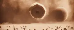 Giant eyes rolling over desert