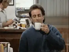 Jerry Seinfeld sipping coffee