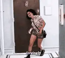 Woman crying dramatically in hallway