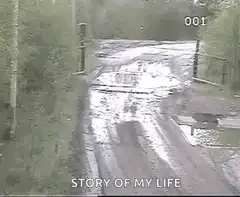 Truck catches fire on muddy road