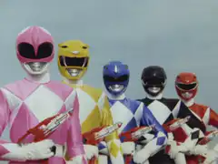 Power Rangers raise their blasters