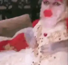 Monkey in makeup smiling