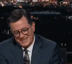 Stephen Colbert points at camera