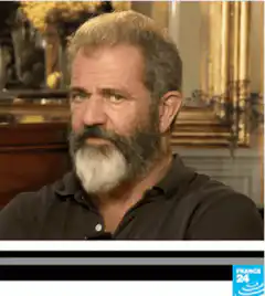 Mel Gibson laughing