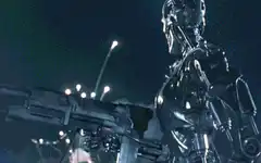 T-800 Terminator firing minigun