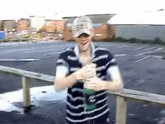 Man opens shaken soda bottle