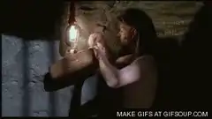 Man sprays lightbulb with water