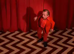 Dancing man in red suit