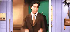 Ross dancing in a suit