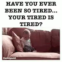 tired baby falls asleep on couch