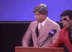 Bill Murray dancing at a podium