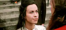 Alyssa Milano smiling and laughing