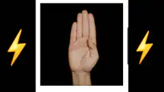 Hand making rock on sign