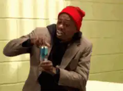 Man drinks and says Shazam