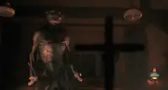 Demon statue cross burns