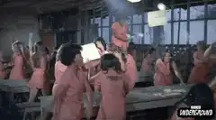 Prisoners riot and throw papers