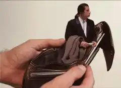 Tiny man in empty wallet