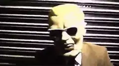 Man in mask and sunglasses dancing