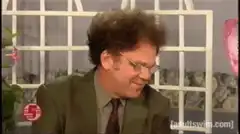 Man gives thumbs up and smiles