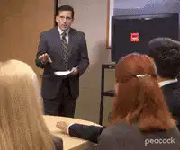 Michael Scott presents to the office