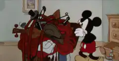 Mickey Mouse packing suitcase