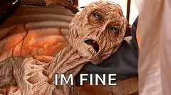 Alien lying down saying im fine