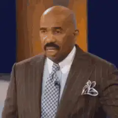 Steve Harvey nodding and smiling
