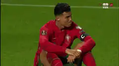 Cristiano Ronaldo sitting on the pitch looking disappointed