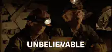 Two miners looking at each other unbelievable